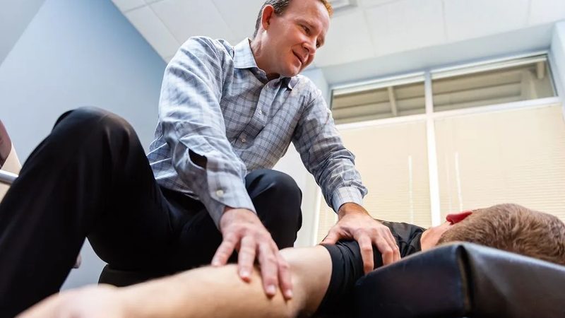 Dr. Matt Christiansen adjusting a patient at Brookfield Chiropractic