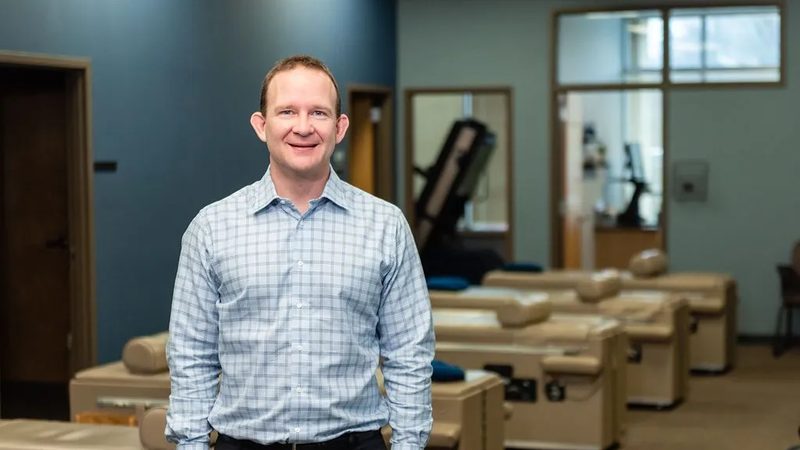 Dr. Matt Christiansen in the treatment room at Brookfield Chiropractic
